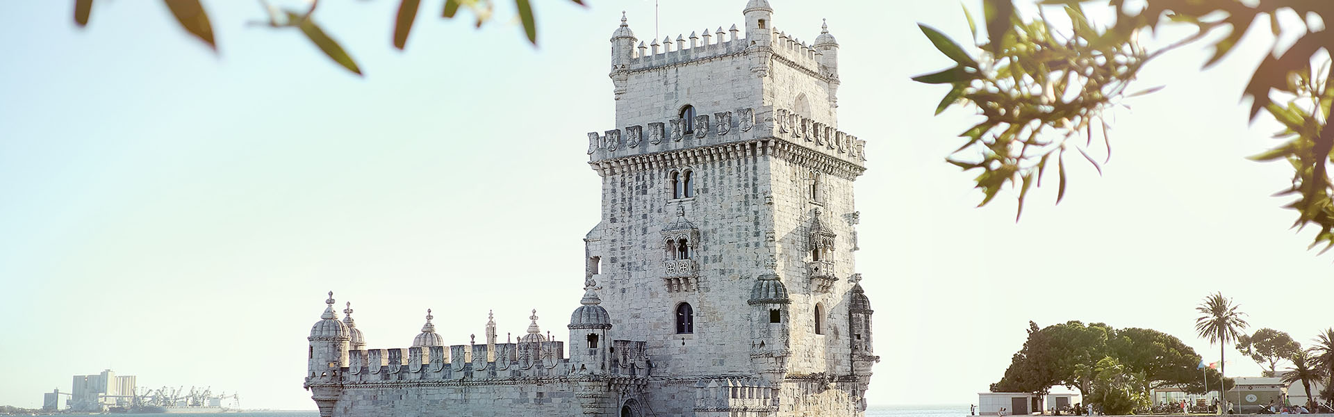 Belem Tower in Portual on coast with tourists