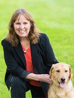 Susan Tornquist with her dog outside