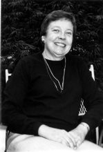 Headshot of Sara Hart in black and white