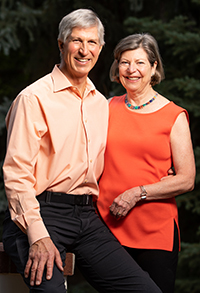 Kenneth and Donna Barrow wearing orange