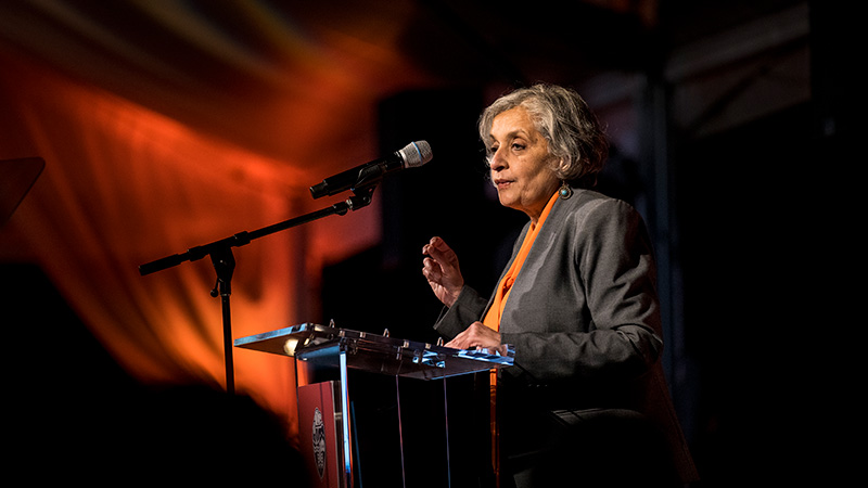 President Murthy speaking at a podium