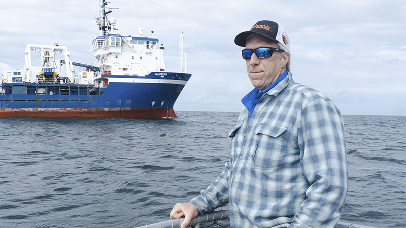 PacWave staff with a ship on the sea