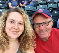 Kevin Kasnick is pictured above with his daughter Madelyn at a baseball game.
