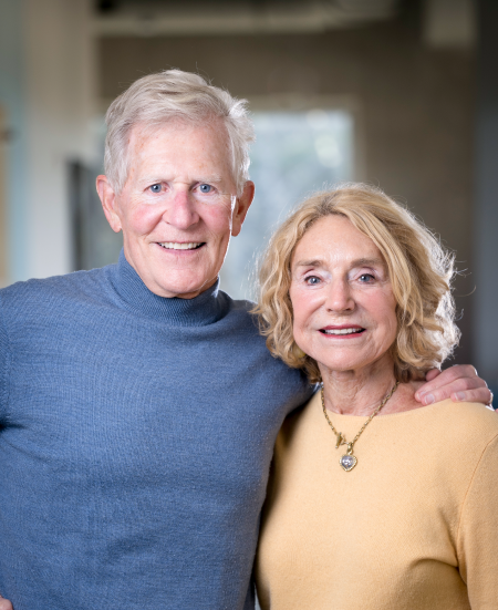 Portrait photo of Mike and Judy Gaulke facing the camera and smiling.
