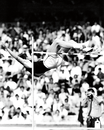 Photo of Dick Fosbury clearing 7 feet, 4 1/4 inches on the high jump to win Olympic gold in Mexico City.