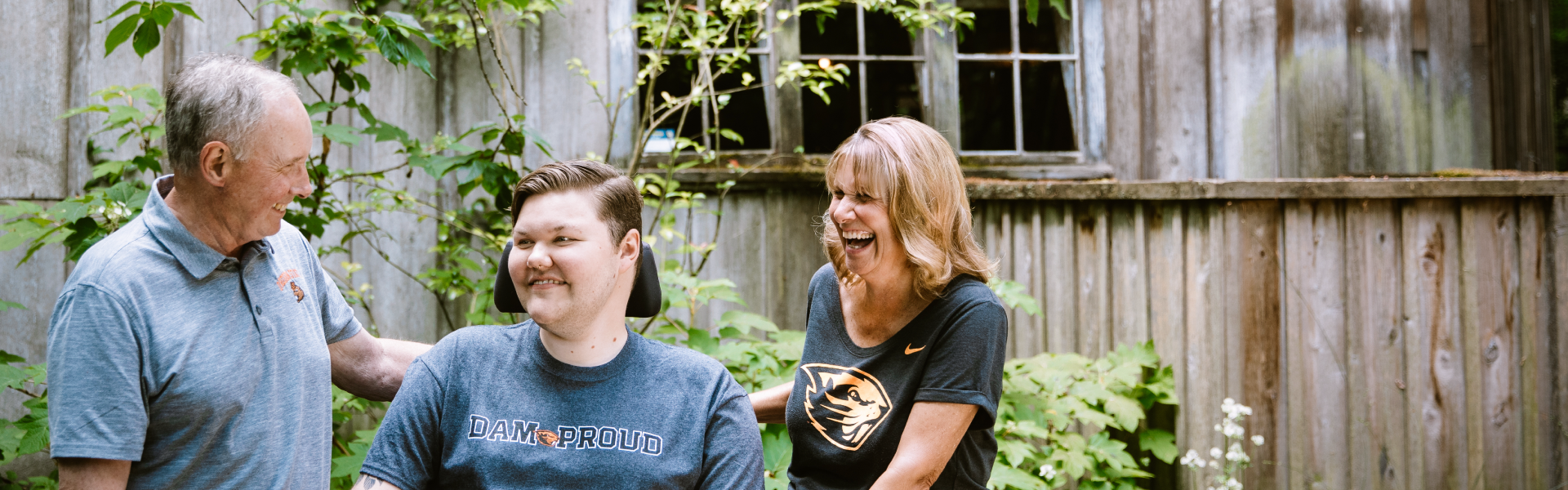 Kolbey Bonin with Deb and Tim Tyler laughing together.