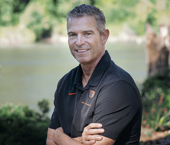 Portrait of David Montagne with a river in the background