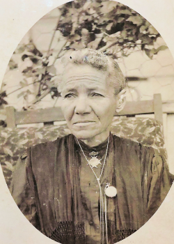 Vintage sepia tone photo in an oval frame of Letitia Carson